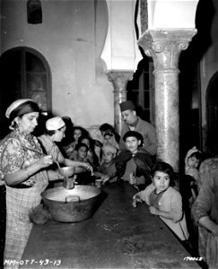 SC 170062 - Arabic children receiving their milk at a school in North Africa. photo