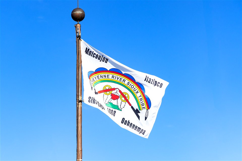 Cheyenne River Sioux Tribe flag over Old Faithful Inn