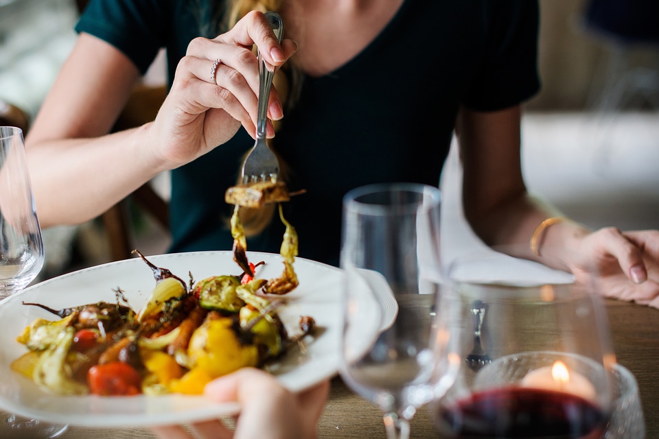 Woman Eating Dinner photo