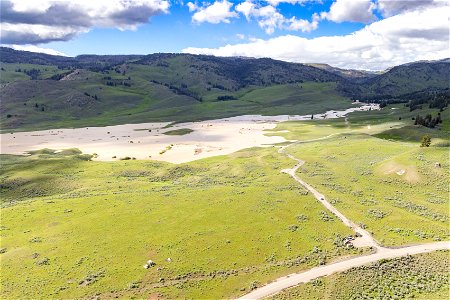 Yellowstone flood event 2022: swollen Slough Creek and Slough Creek Road photo