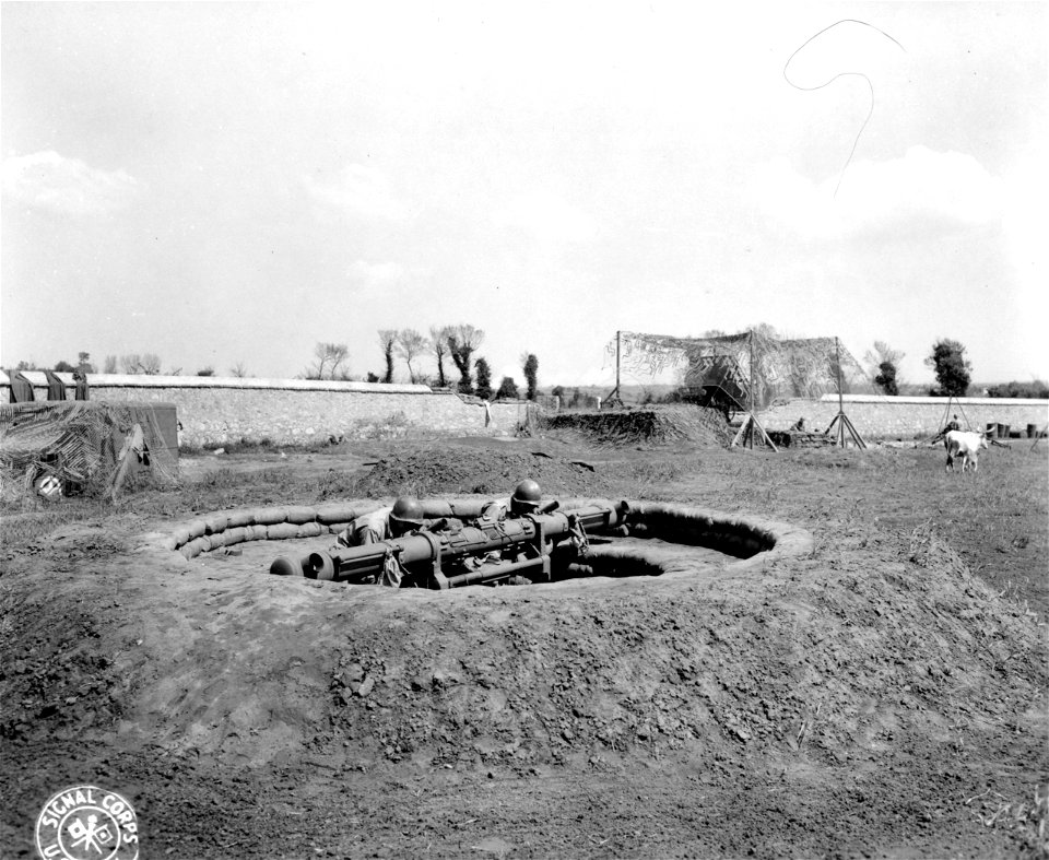 SC 396859 - 108th Gun Bn., camouflage and concealment of 90mm AA gun battery height finder, dug in. Anzio area, Italy. 10 April, 1944.