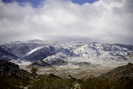 Snow-covered mountains near West Entrance photo