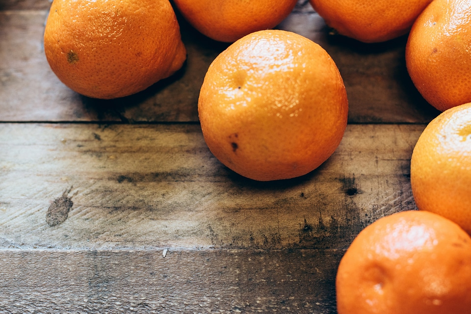 Oranges on Wood Table