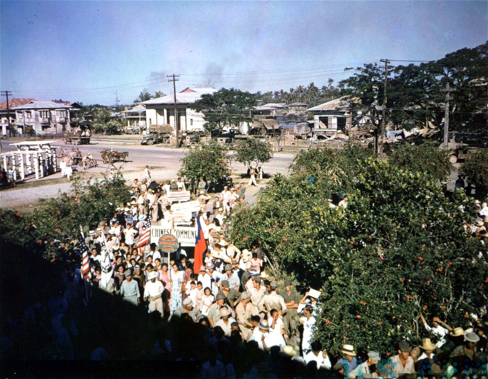 C-678 - A scene during the Liberation Parade, staged by citizens of Dagupan, Luzon, P.I., to show their gratitude to Americans and to introduce the Pangasinian Unit, 2nd Bn., 12th Inf. Regt., McKinley Brigade of guerillas.