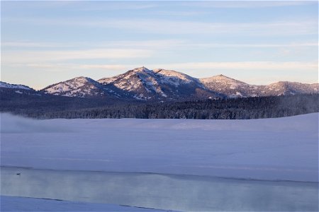 View of the Yellowstone River and Mount Washburn in Hayden Valley photo