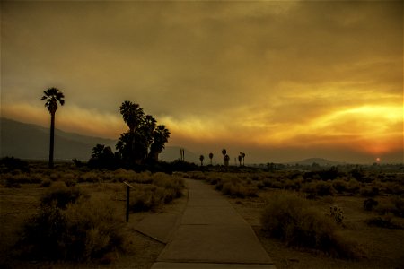 Oasis of Mara with smoke from the Apple Fire at sunset photo