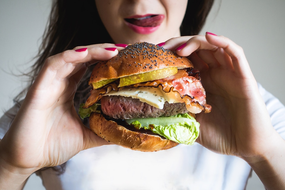 Woman Eating Burger