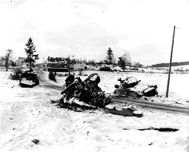 SC 198854 - Photo shows wrecked German equipment, left in the wake of the 35th Division's thrust which ousted Nazis from Lutremange, Belgium. 13 January, 1945. photo