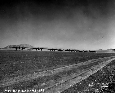 SC 170046 - B-25 bombers taking off for a raid. Berteux, North Africa. 12 February, 1943.