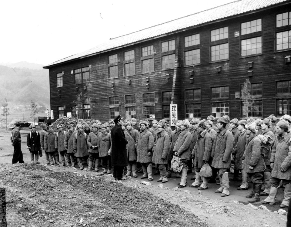 SC 337413 - Japanese repatriates receive instructions shortly after their arrival in Japan.