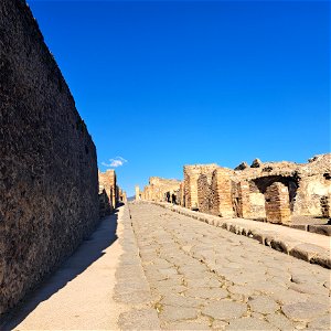 Street by large house Ruins Pompeii Italy
