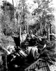SC 364515 - 90mm dual-purpose AA guns were brought up to try to silence some of the Jap artillery. photo