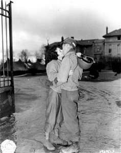 SC 196051-S - Husband and wife serving in uniform meet for the first time on the continent--Lt. Jane I. Sunderbruch, Army Nurse Corps, assigned to an evacuation hospital, and her husband, Lt. Richard K. Sunderbruch, Davenport, Iowa...
