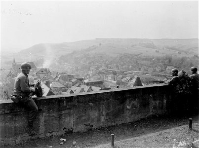 SC 335321 - L-R: Pfc. Gordon S. Cagle, Spring City, Tenn., Pfc. Woodrow Johnston, Phillipsburg, Pa., and Sgt. Edward Wojtalik, Detroit, Mich., three 71st Division infantrymen...