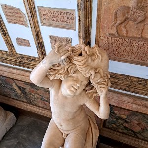 Boy with creepy Mask Capitoline Museum Rome Italy