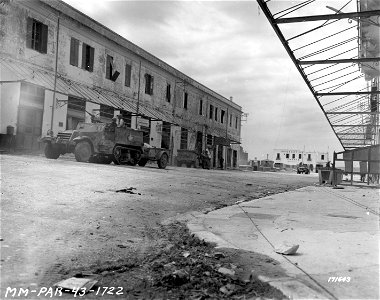 SC 171643 - Town of Mateur, Tunisia being occupied by American soldiers after the German Army hastily retreated. 8 May, 1943.