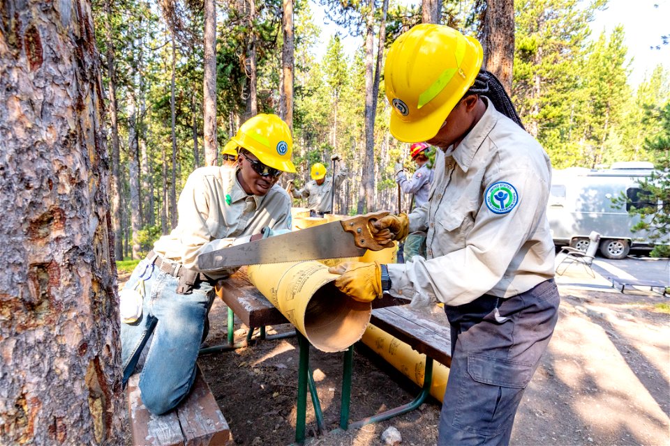 YCC Alpha Crew 2021 Canyon Campground bear box installation: cutting concrete form tubes