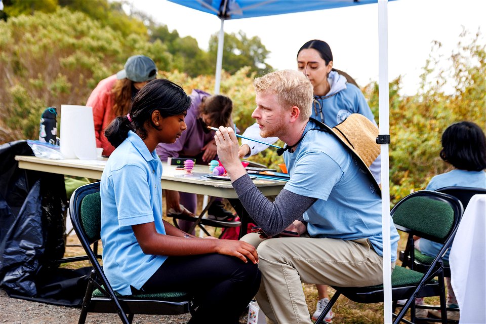 Face painting with refuge volunteers
