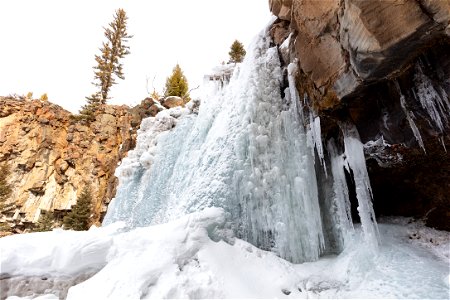 Frozen brink of Undine Falls photo
