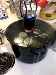 Removing grape jelly from boiling water canner