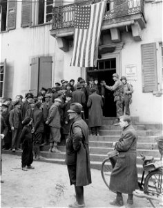 SC 335274 - An American flag now hangs on the Allied Military Government building in Homburg, Germany. photo