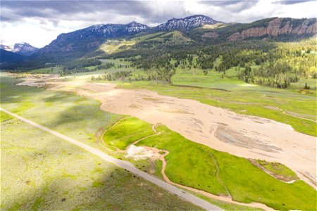 Yellowstone flood event 2022: Swollen Soda Butte Creek and Mt. Norris photo