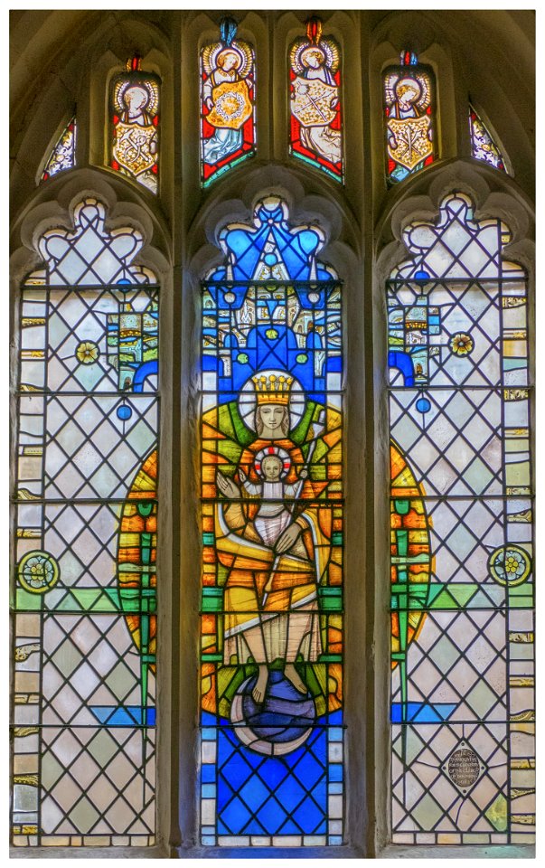 This stained glass window in Boxley Church contains fragments of medieval stained glass from Rochester Cathedral.