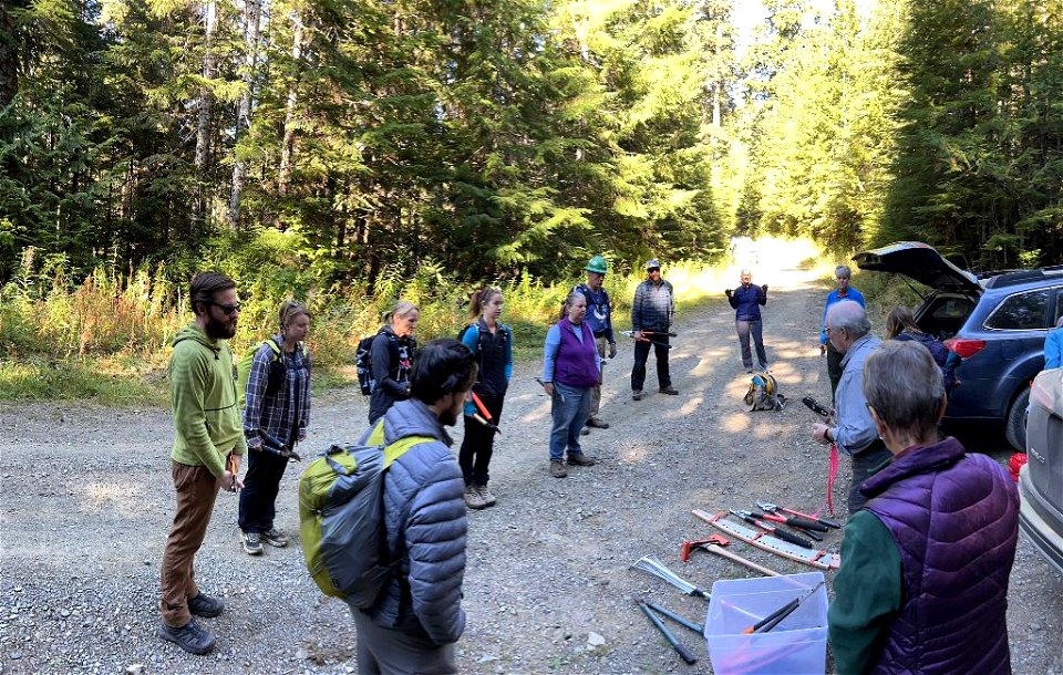 Tailgate safety briefing before doing volunteer trail work on Church Creek Trail on the Olympic National Forest with the Mountaineers