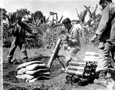 SC 364520 - Mortar squad of the 85th Chemical Mortar Bn. shelling Mt. Macolod, Batangas Prov., Lamon, P.I.