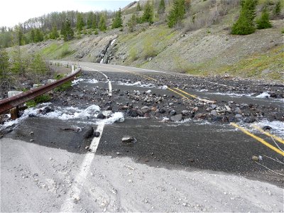 20230515_Ground view of water flowing over roadway_USGS_K Spicer_DSCN1985