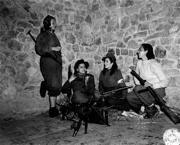 SC 195618-S - Women partisans working on the Castellucio front relax while waiting for their turn to go on patrol.