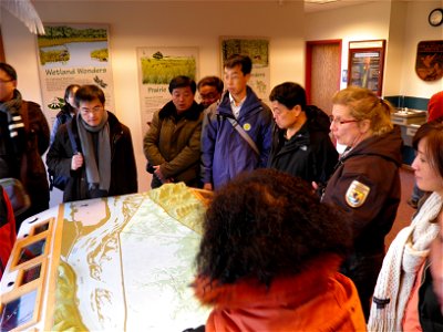 Vickie Hirschboeck welcomes China visitors to Trempealeau NWR