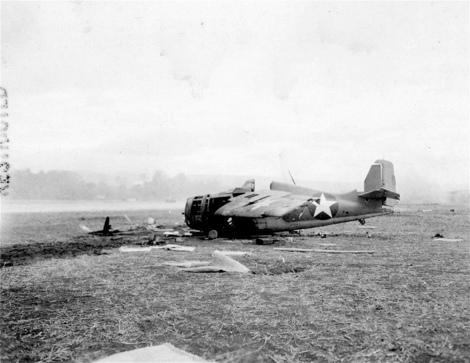 One of our planes wrecked by Jap bombs in raid on Henderson Field, Guadalcanal. September-December, 1942.