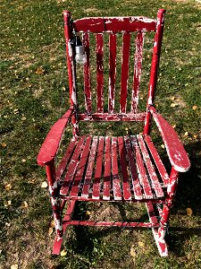 Red Rocker in Green Grass