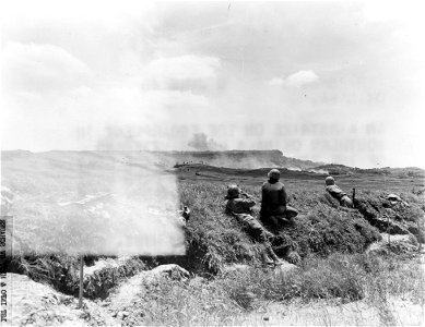 SC 270797 - An airstrike on the escarpment in Southern Okinawa where veterans of the 7th Inf. Div. are meeting heavy resistance as the Japs make their final defensive stand. 6 June, 1945.