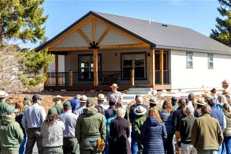 Housing improvement project goal 1 ribbon-cutting: Cam Sholly, superintendent, speaks to a group of employees (2)