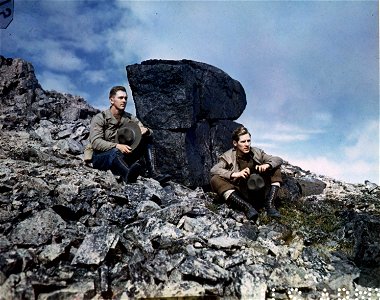 C-862 - Cpl. James Glending, left, and Cpl. James Kenning take a brief rest during a mountain climbing trip in Greenland. photo