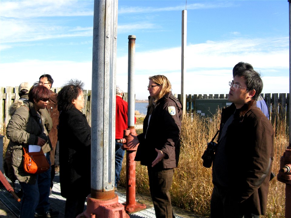 Biologist Wendy Woyczik explains water management at a pump station