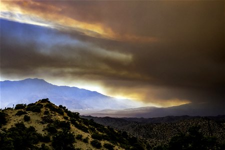 Smoke from the Apple Fire over desert hills and San Jacinto photo