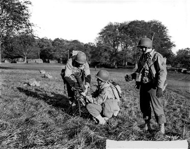 SC 166539 - Members of a 81mm mortar crew in Northern Ireland assembling their mortar during recent battle practice. photo