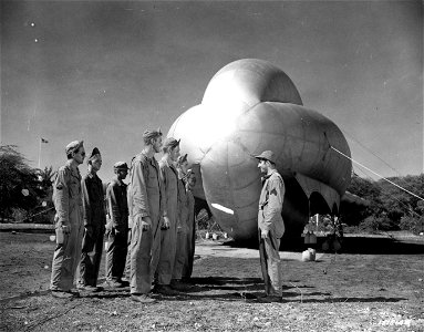 SC 151514 - The Sgt. quickly barks orders to prepare for the raising of a barrage balloon at Fort Kam tactics, Hawaii.