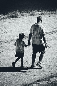 Father And Son Holding Hands photo