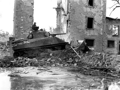 SC 195714 - Tank-dozer of 752nd Tank Bn. with 88th Div. clearing rubble in Firenzuola. 23 September, 1944. photo