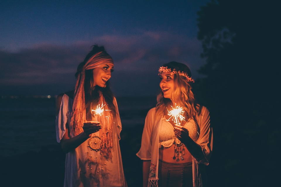 Women Holding Sparklers Evening