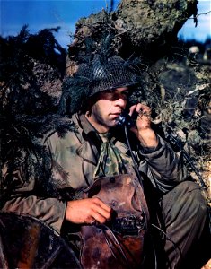 C-3026 - Field line telephones must be laid and kept in repair on the frontlines for vital communications. photo