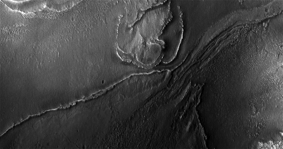 A Channel and Fan in Lyot Crater