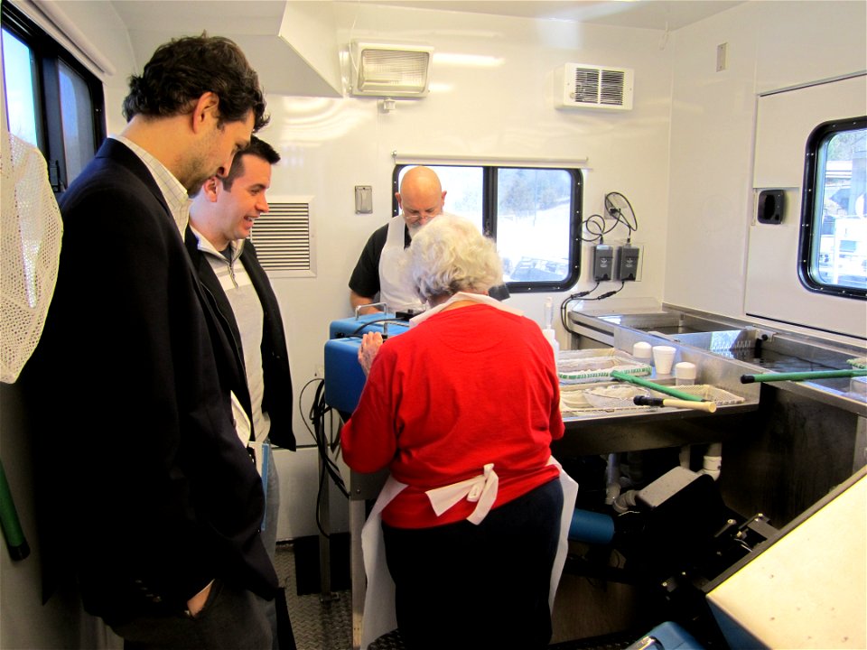 The hand clipping station in the back of the AutoFish trailer