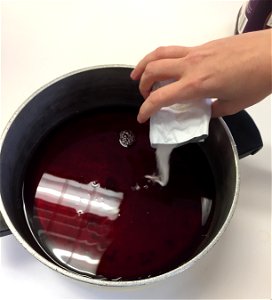 Adding pectin to grape juice photo