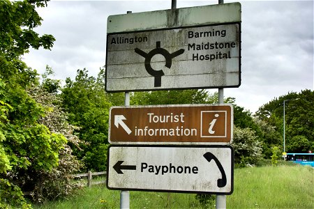 The Payphone and Tourist Information went many years ago. The sign still remains!