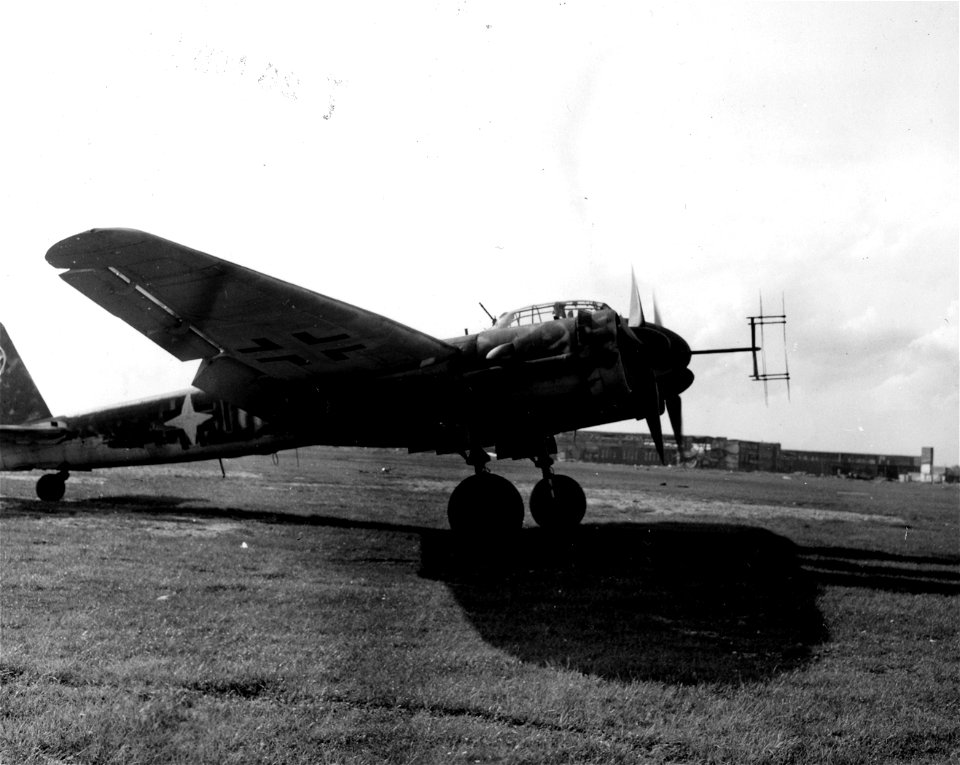 SC 196231 - A German Ju-188 with crude stars over the German crosses slows down after landing at the 72nd Liaison Air Strip. The pilot flew in from Czechoslovakia.
